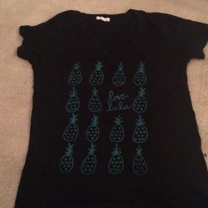 Black shirt with green print